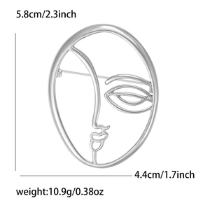 Abstract silver outline face brooch in oval frame with size and weight dimensions