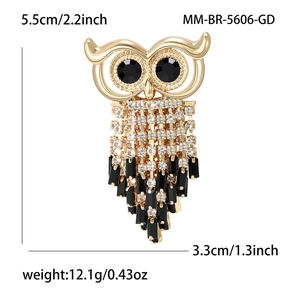 Chic golden owl brooch with sparkling crystals and elegant dangling fringe tassels