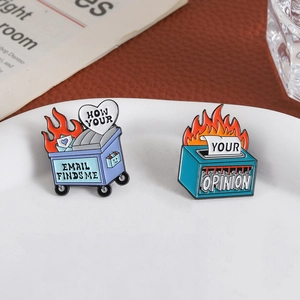 Funny enamel pins featuring a burning trash can and paper shredder for office humor