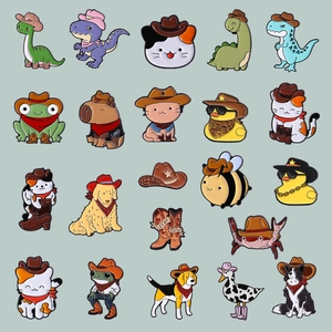 Enamel lapel pin set featuring cute cartoon animals in cowboy hats and boots