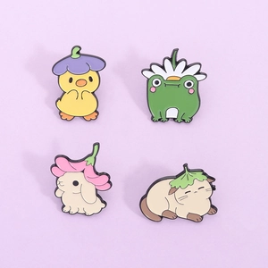 Set of 4 cute enamel pins featuring a yellow duck, green frog, rabbit and cat with flower hats
