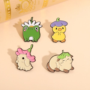 Set of 4 cute animal enamel pins featuring a green frog, yellow chick, rabbit, and cat