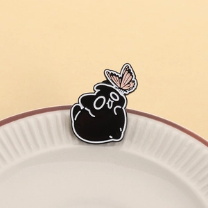 Cute black cartoon ghost enamel brooch with pink butterfly on white ceramic plate