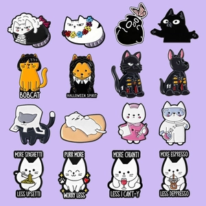 Set of 16 cute cartoon cat enamel pins in various themes on a soft purple background