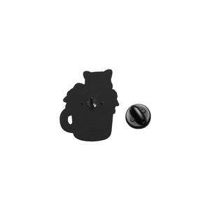 Detailed back view of enamel pin with matte black finish and secure rubber clutch
