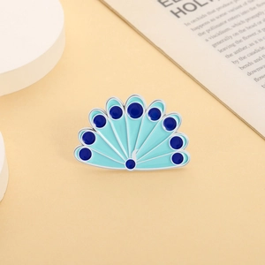 Peacock feather enamel brooch in blue and green hues with a silver metal frame