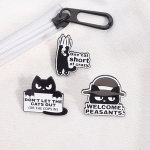 Three-piece black cat enamel pins set featuring funny quotes on white canvas
