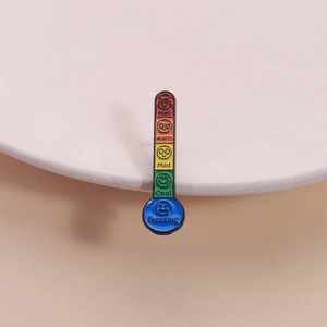 Creative thermometer mood enamel pin featuring colorful temperature levels and expressions
