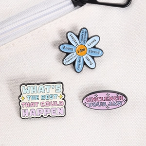 Set di tre spille in smalto con fiori blu e frasi motivazionali per abbigliamento