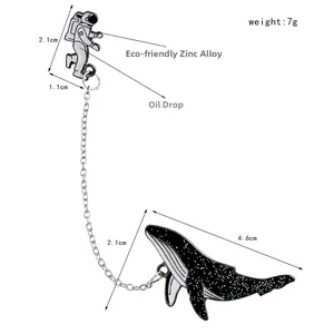 Detail of astronaut and space whale chain brooch showing dimensions and 7g weight