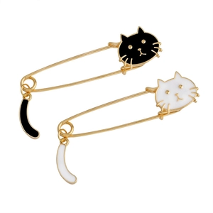 Broches épingles chat en émail noir et blanc avec queues mobiles en finition dorée