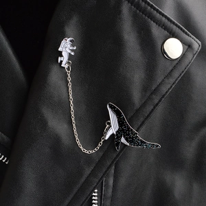 Astronaut and cosmic whale enamel brooch pin set with silver chain on black leather