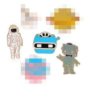 Space enamel pins set featuring astronaut, robot and planets with gold metal plating