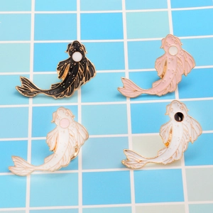 Set of four cute cartoon koi fish enamel pins in black, pink, and white colors