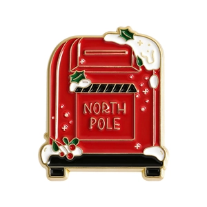 Weihnachtliche Nordpol Emaille-Anstecknadel in Rot mit goldenem Rand und Schnee