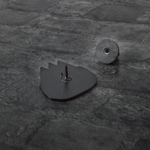 Detailed view of the mountain brooch back with metal pin and black rubber clutch