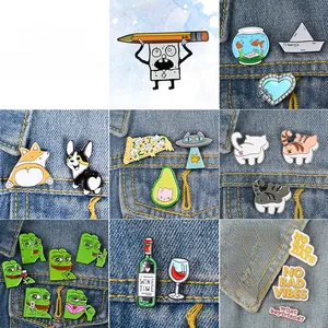 Detail showing colorful enamel pins on denim with cartoon, pet, and food designs