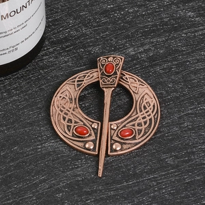 Vintage bronze Viking Celtic knot circular brooch with three red ruby oval gemstones