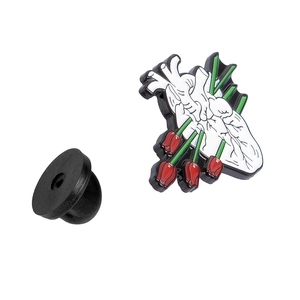 Detail view of artistic heart and tulip enamel brooch with a black rubber back pin