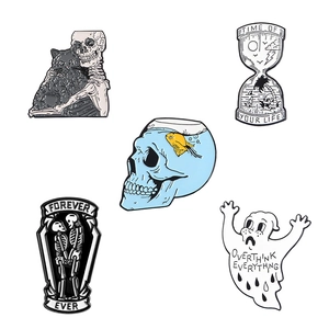 Gothic enamel pin set with skull, hourglass and ghost designs in black and white finish