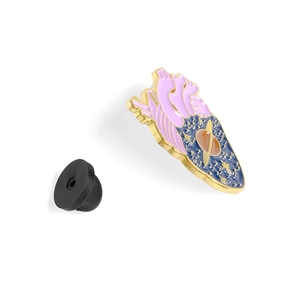 Detailed view of enamel heart brooch with planet rings and black rubber clutch backing