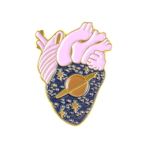 Cartoon enamel heart brooch featuring a starry galaxy and pink anatomical design