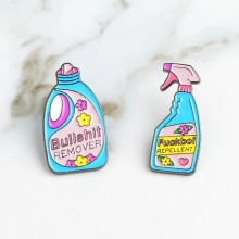 Detail view of Enamel Pins set featuring Bullshit Remover and Fuckboi Repellent designs