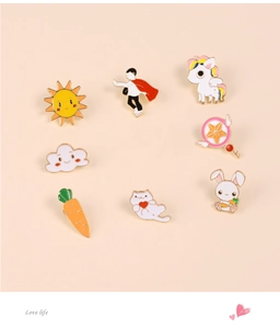 Detailed macro view of colorful enamel pins collection with cute cartoon metal badges