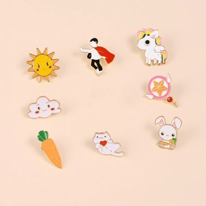 Detailed close-up of 8 cute cartoon enamel pins including unicorn and rabbit shapes