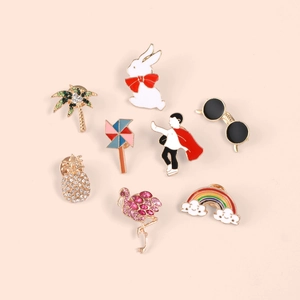 Detailed set of 8 cartoon enamel pins featuring rabbit, windmill, and pineapple designs