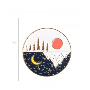 Detail of 1.1-inch round enamel pin showing day and night landscape with mountains