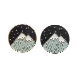 Cartoon nature enamel pins featuring mountain landscape and starry night sky design