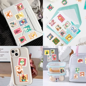 50 autocollants de Noël style timbres avec Père Noël, rennes et motifs festifs variés