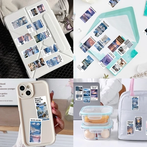 Showcase of winter scenery stickers applied on daily items like tablet and envelopes
