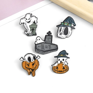 Detailed view of Halloween enamel pins set featuring spooky ghost and pumpkin designs