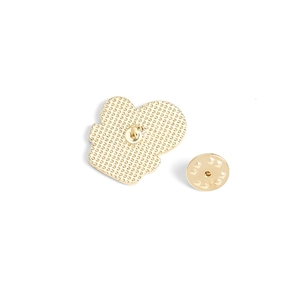 Cartoon plant enamel pin back view with golden butterfly clutch and textured finish