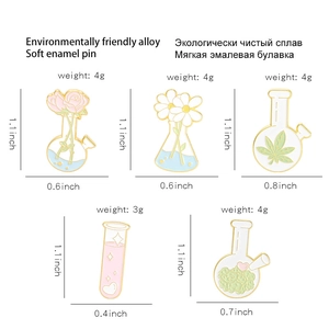 Chic pastel enamel pin set with flower flasks and botanical laboratory designs