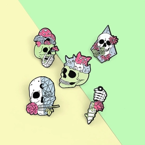 Set of five gothic enamel pins featuring skulls with flowers, mushrooms, and cats detail