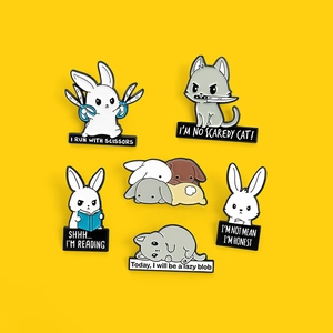 Set of 6 cute cartoon animal enamel pins featuring rabbit and cat motifs with witty text
