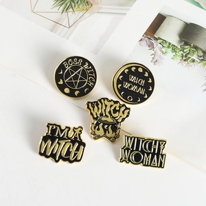 Retro black and gold enamel witch pins set with pentagram and moon phase designs
