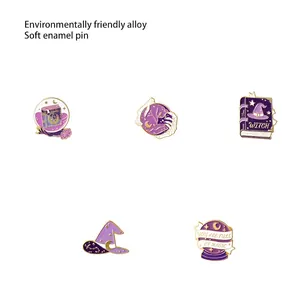 5-piece set of purple magic enamel pins featuring wizard hat and book designs