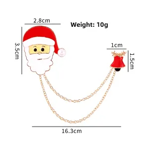 Dettaglio della spilla Babbo Natale in lega con campanello rosso e misure in cm