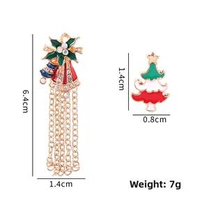 Vista dettagliata di orecchini ad albero e campanella di Natale con misure e peso 7g