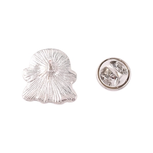 Ghost-shaped silver metal lapel pin badge with butterfly clutch backing on white