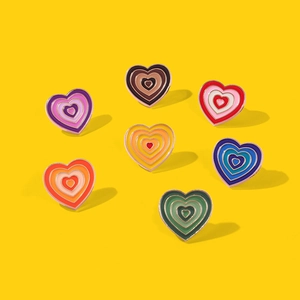 Set of 7 Y2K gradient heart enamel pins with colorful concentric metal badge designs