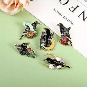 Set of five gothic crow enamel pins with dark aesthetic, black raven and red rose designs