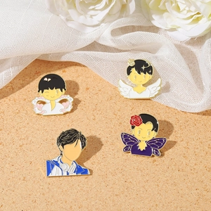 Set of 4 cute enamel lapel pins with anime figures and artistic gold-plated metal borders