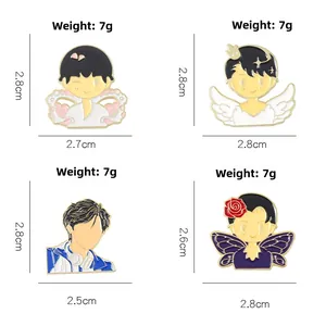 Detailed macro view of four cartoon enamel pins showing 7g weight and 2.8cm dimensions