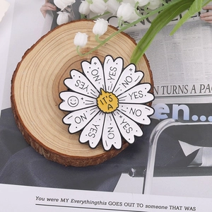 Rotating daisy enamel brooch with Yes No petals and sunflower design for clothing