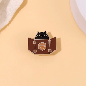 Cute black cat enamel pin with D20 dice and screen for tabletop gaming fans